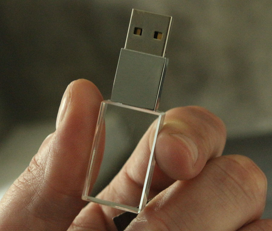 Clé Usb personnalisée avec vos plus beaux souvenirs.